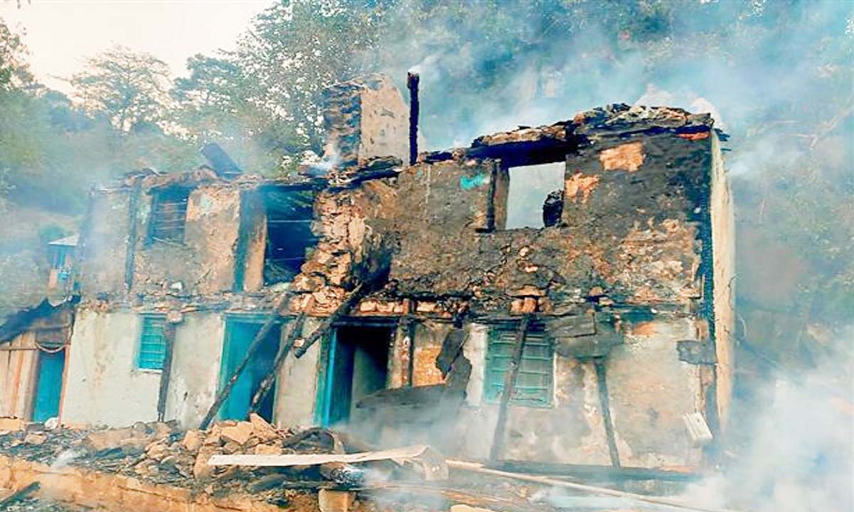 A two-storey wooden house burnt to ashes in Mandi village