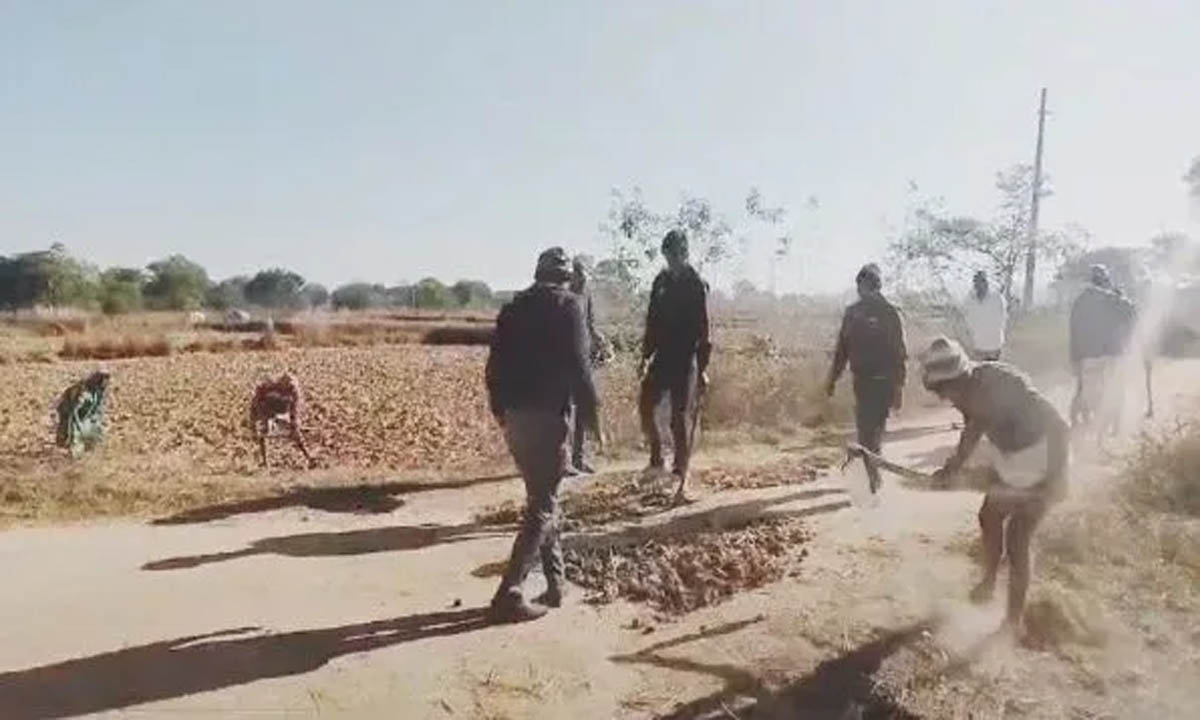 It is the villagers, not the government, who are repairing the bad roads. Watch video.