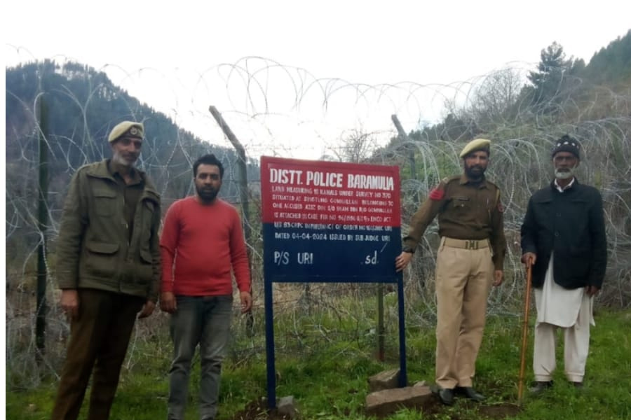 Police attached property of three declared criminals in Baramulla