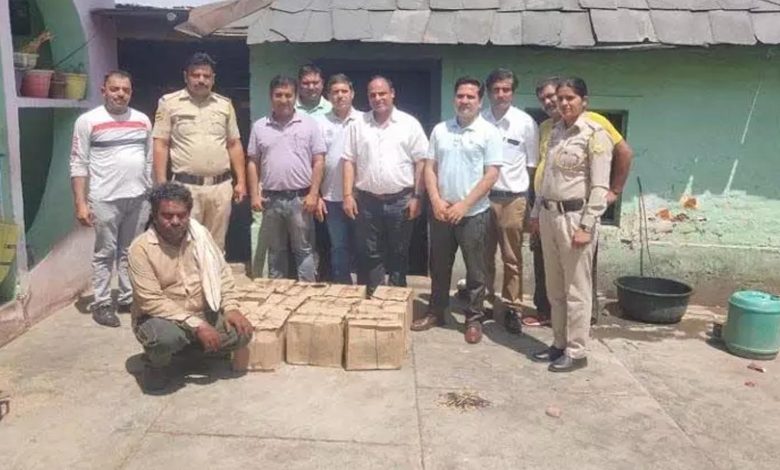 One arrested with 14 boxes of country liquor
