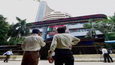 Sensex, Nifty remained almost stable in highly volatile trading