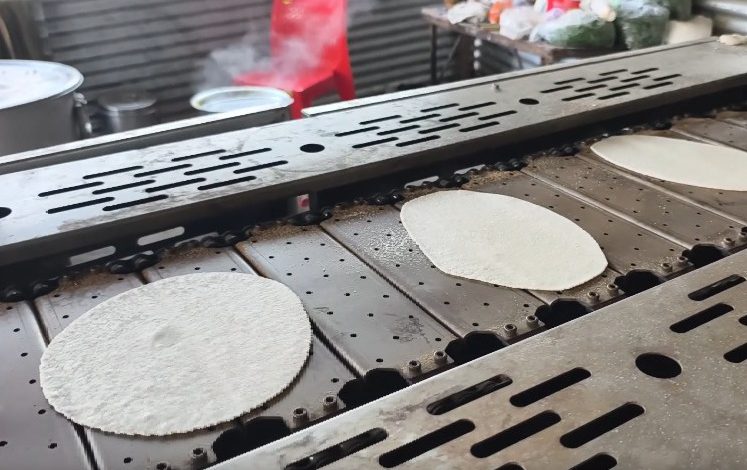 Machines are preparing Prasad for lakhs of devotees at the Magh Mela in Prayagraj.